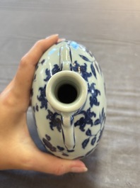 A rare Chinese blue and white 'magpie among flowering branches' moonflask, Yongzheng/Qianlong