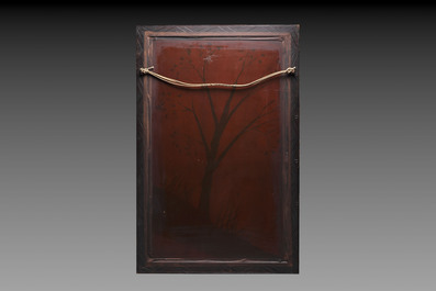 A pair of large Japanese bone-inlaid lacquered wooden panels with birds among flowering branches, 19/20th C.