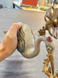 A pair of Chinese cloisonn&eacute; cranes, later mounted as candelabras, 19th C.