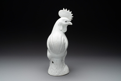 A Chinese white-glazed model of a rooster, 19th C.