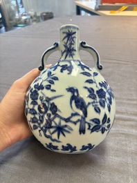 A rare Chinese blue and white 'magpie among flowering branches' moonflask, Yongzheng/Qianlong