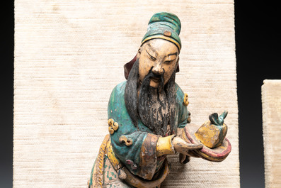 Three Chinese polychrome pottery figures, 19th C.