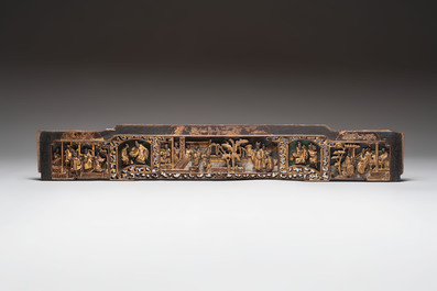 Six Chinese gilt-lacquered carved wooden panels with narrative design, 19th C.