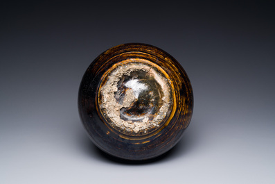 A Korean monochrome brown-glazed bottle vase, Goryeo, 15/16th C.