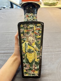 A Chinese robin's egg-glazed vase with relief floral design and a famille noire 'Four Heavenly Kings' vase, 19th C.