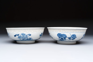 A pair of Chinese blue and white relief-border 'Lan Caihe' bowls, Kangxi