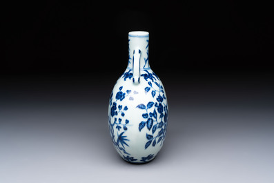 A rare Chinese blue and white 'magpie among flowering branches' moonflask, Yongzheng/Qianlong