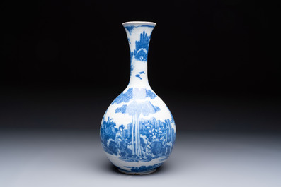 A blue and white Dutch Delft Transitional style chinoiserie bottle vase, late 17th C.