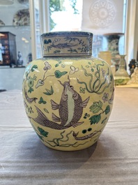A pair of Chinese verte biscuit 'fish' jars and covers, 19th C.