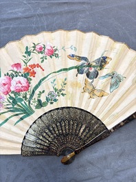 Two Chinese Canton gilt-lacquered and painted paper fans, one with its original box, 19th C.