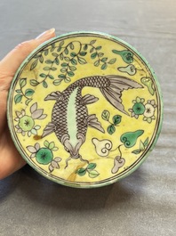 A pair of Chinese verte biscuit 'fish' jars and covers, 19th C.