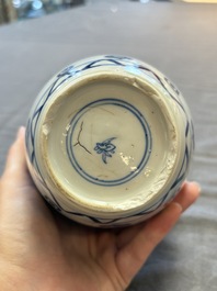 Three Chinese blue and white vases, one with wooden cover, Kangxi