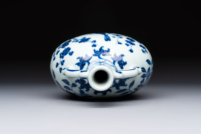 A rare Chinese blue and white 'magpie among flowering branches' moonflask, Yongzheng/Qianlong
