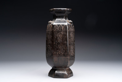 A rare Chinese hexagonal archaistic bronze vase with flame design, Song/Yuan