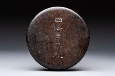 A Chinese carved circular Duan inkstone in a zitan box, signed Dong Jiaozeng 董教增, 18/19th C.