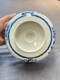 A pair of Chinese blue and white relief-border 'Lan Caihe' bowls, Kangxi