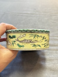 A pair of Chinese verte biscuit 'fish' jars and covers, 19th C.