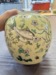 A pair of Chinese verte biscuit 'fish' jars and covers, 19th C.