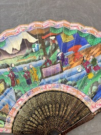 Two Chinese Canton gilt-lacquered and painted paper fans, one with its original box, 19th C.