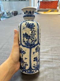Three Chinese blue and white vases, one with wooden cover, Kangxi