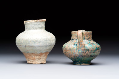 Two Raqqa turquoise-glazed pottery jars with black design, Syria, 12/13th C.
