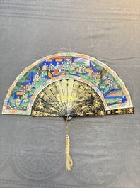 Two Chinese Canton gilt-lacquered and painted paper fans, one with its original box, 19th C.