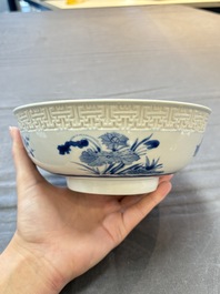 A pair of Chinese blue and white relief-border 'Lan Caihe' bowls, Kangxi