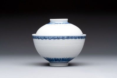 A Chinese blue and white covered bowl with incised floral design, Yongzheng/Qianlong