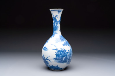 A blue and white Dutch Delft Transitional style chinoiserie bottle vase, late 17th C.