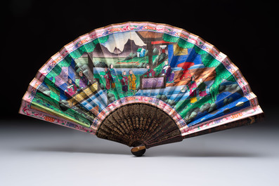 Two Chinese Canton gilt-lacquered and painted paper fans, one with its original box, 19th C.