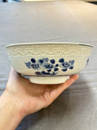 A pair of Chinese blue and white relief-border 'Lan Caihe' bowls, Kangxi