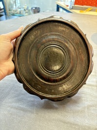 A Chinese famille rose pink-ground 'kamcheng' bowl and cover for the Straits or Peranakan market, on a wooden stand, 19th C.