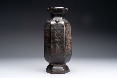 A rare Chinese hexagonal archaistic bronze vase with flame design, Song/Yuan