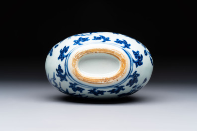 A rare Chinese blue and white 'magpie among flowering branches' moonflask, Yongzheng/Qianlong