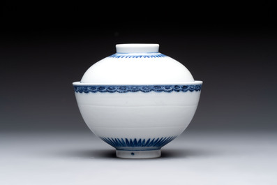 A Chinese blue and white covered bowl with incised floral design, Yongzheng/Qianlong