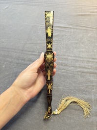 Two Chinese Canton gilt-lacquered and painted paper fans, one with its original box, 19th C.