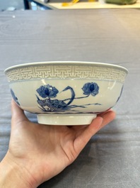 A pair of Chinese blue and white relief-border 'Lan Caihe' bowls, Kangxi