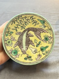 A pair of Chinese verte biscuit 'fish' jars and covers, 19th C.