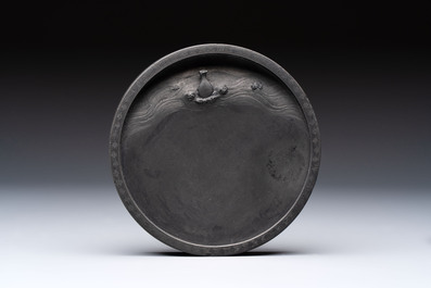A Chinese carved circular Duan inkstone in a zitan box, signed Dong Jiaozeng 董教增, 18/19th C.