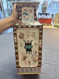 A pair of Chinese famille rose relief-moulded rectangular 'antiquities' vases, 19th C.