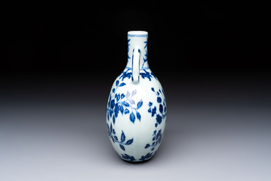 A rare Chinese blue and white 'magpie among flowering branches' moonflask, Yongzheng/Qianlong