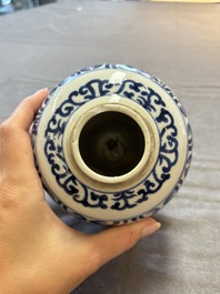 Three Chinese blue and white vases, one with wooden cover, Kangxi