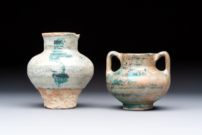 Two Raqqa turquoise-glazed pottery jars with black design, Syria, 12/13th C.
