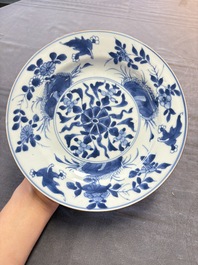 12 Chinese blue and white plates with figural and floral design, 18th C.