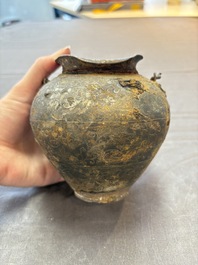 A rare Chinese parcel-gilt silver handled jar with floral scroll design, Tang