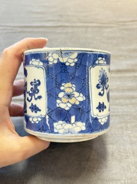 Two Chinese blue and white vases, a covered jar and a brush pot, Kangxi and later