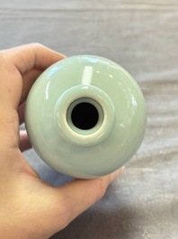 A Chinese flamb&eacute;-glazed cylindrical jardini&egrave;re and two celadon-glazed vases, 19th C.