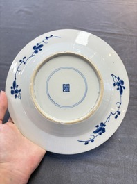 12 Chinese blue and white plates with figural and floral design, 18th C.