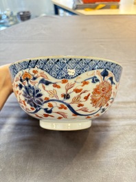 Seven Chinese Imari-style and famille rose bowls with floral and figural designs, 18th C.