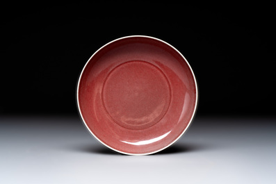A Chinese copper-red-glazed plate, a meiping vase and two water pots, Kangxi marks, 19/20th C.